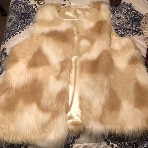 White and beige fur vest